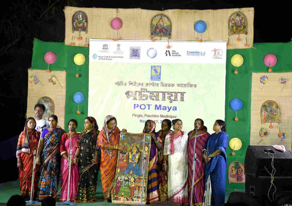 Artists are performing Pater Gaan (Patachitra songs) at the POT Maya festival. Photo: Banglanatak dot com Artists are performing Pater Gaan (Patachitra songs) at the POT Maya festival. Photo: Banglanatak dot com