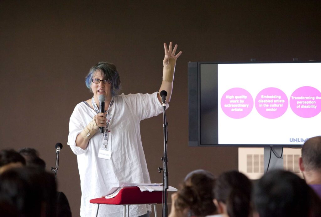 Unlimited Senior Producer Jo Verrent speaking at 'History & Context of Disability Arts in the UK' talk at Southbank Centre's Unlimited Festival 2016 Photo by Rachel Cherry Unlimited Senior Producer Jo Verrent speaking at 'History & Context of Disability Arts in the UK' talk at Southbank Centre's Unlimited Festival 2016 Photo by Rachel Cherry